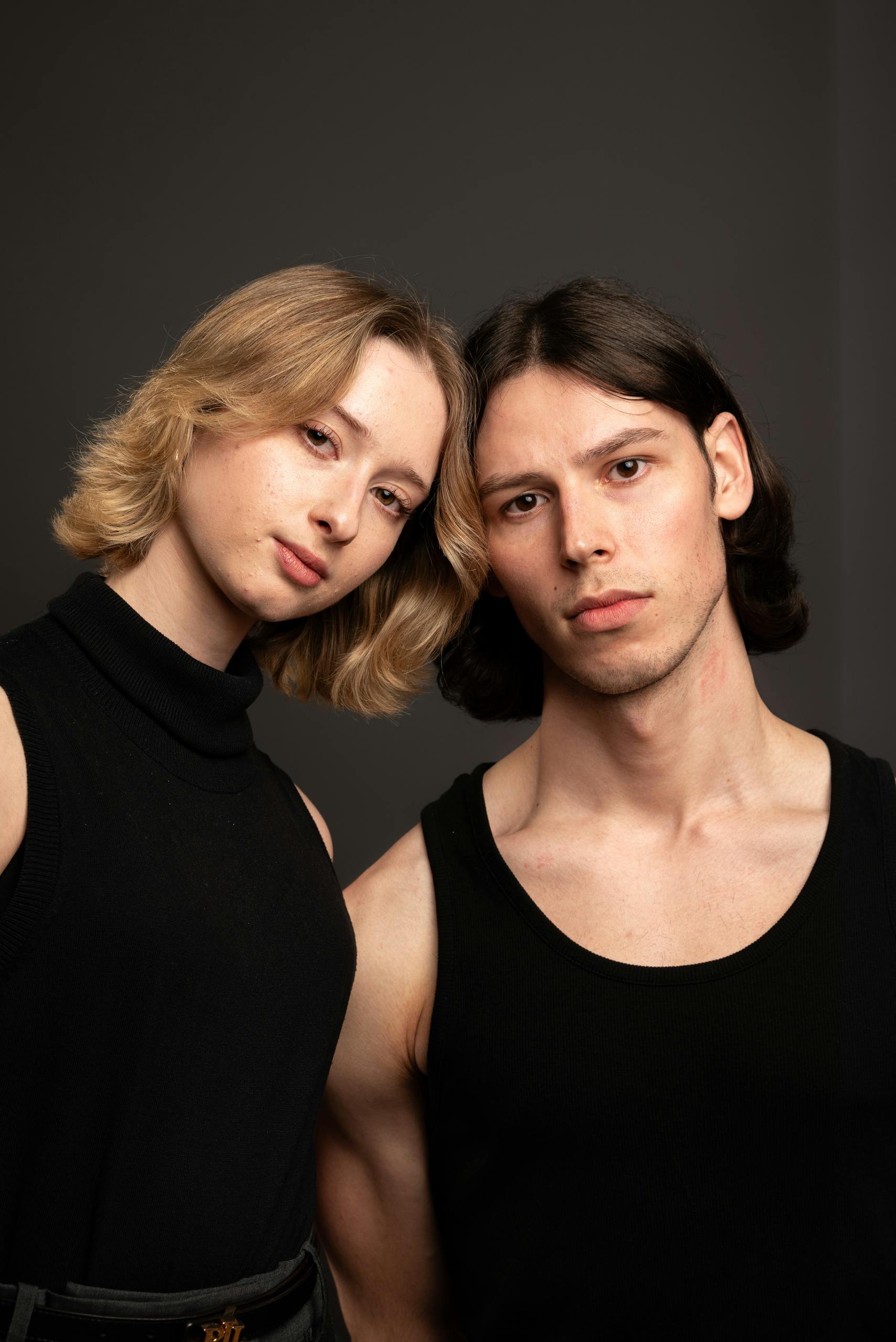 Elegant portrait of two young adults with a stylish vibe, captured in Hamburg, Germany.